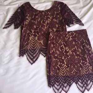 Two piece lace skirt and shirt set.